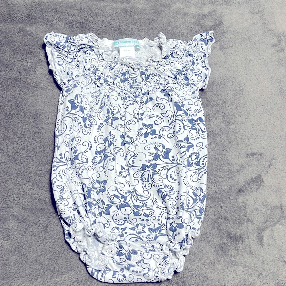 Feather baby.  SUPER SOFT. excellent condition. Made in Peru.